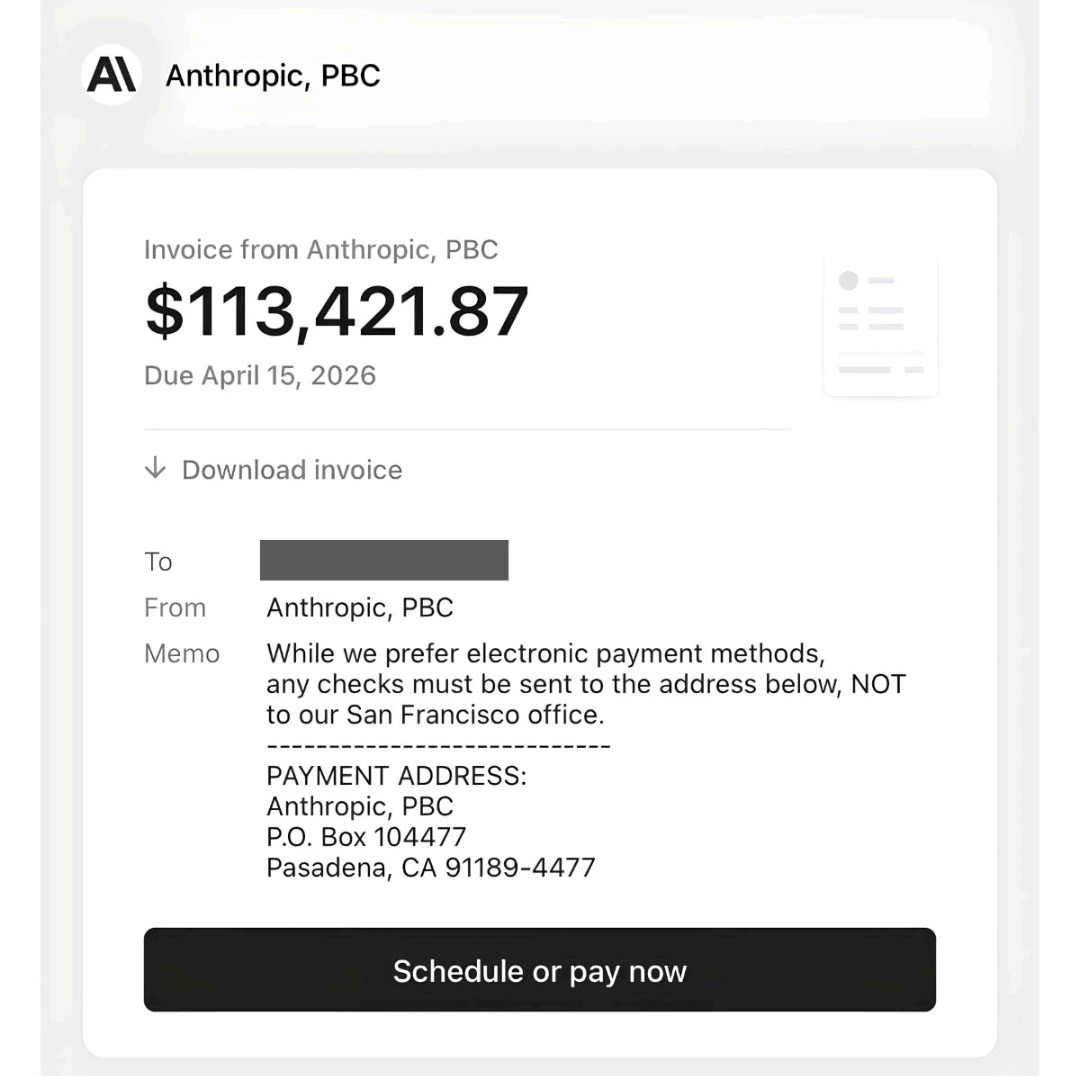 An Anthropic, PBC invoice for $113,421.87 for a single month, with a memo directing check payments to a P.O. Box.